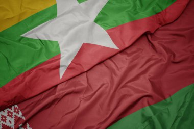 Belarus 'un renkli bayrağı ve Myanmar' ın ulusal bayrağı sallanıyor. makro