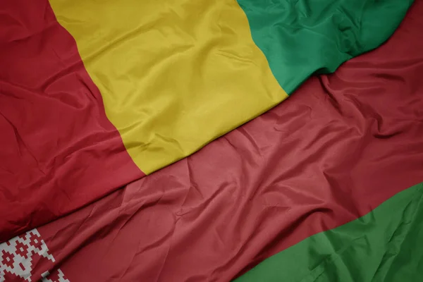 Viftande Färgglada Flagga Belarus Och Nationell Flagga Guinea Makro — Stockfoto