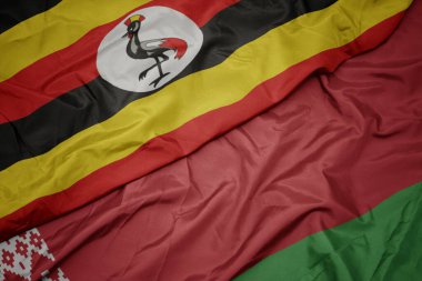 Beyaz Rusya bayrağı ve Uganda bayrağı sallıyordu. makro