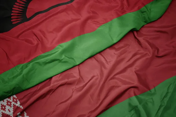 Zwaaiende Vlag Van Belarus Nationale Vlag Van Malawi Macro — Stockfoto