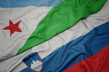 Slovakya 'nın renkli bayrağı ve Cibuti' nin ulusal bayrağı sallanıyor. makro