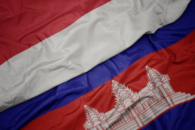 Kamboçya 'nın renkli bayrağı ve Endonezya' nın ulusal bayrağı sallanıyor. makro