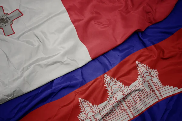Schwenken Bunte Flagge Kambodschas Und Nationalflagge Maltas Makro — Stockfoto