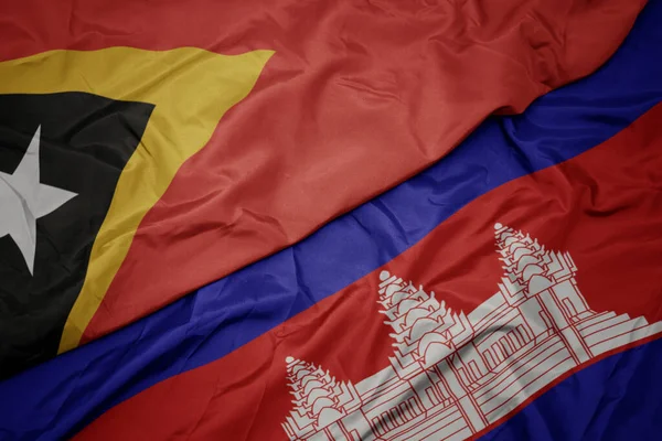 Размахивая Красочным Флагом Камбоджи Национальным Флагом Восточного Тимора Macro — стоковое фото