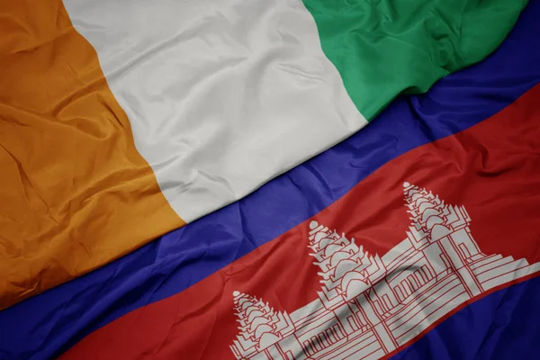 Acenando Bandeira Colorida Cambodia Bandeira Nacional Cote Divoire Macro — Fotografia de Stock