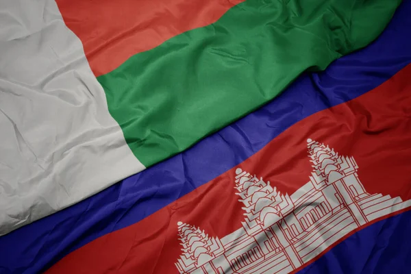 Acenando Bandeira Colorida Cambodia Bandeira Nacional Madagascar Macro — Fotografia de Stock