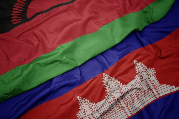 Размахивая Красочным Флагом Камбоджи Национальным Флагом Малави Macro — стоковое фото