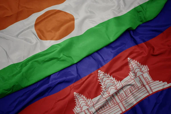 Acenando Bandeira Colorida Cambodia Bandeira Nacional Niger Macro — Fotografia de Stock