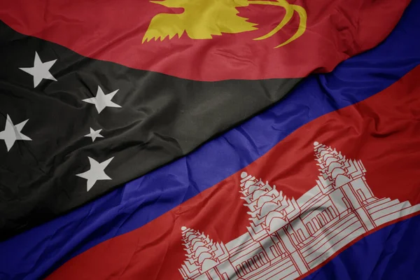 Acenando Bandeira Colorida Cambodia Bandeira Nacional Papua Nova Guiné Macro — Fotografia de Stock