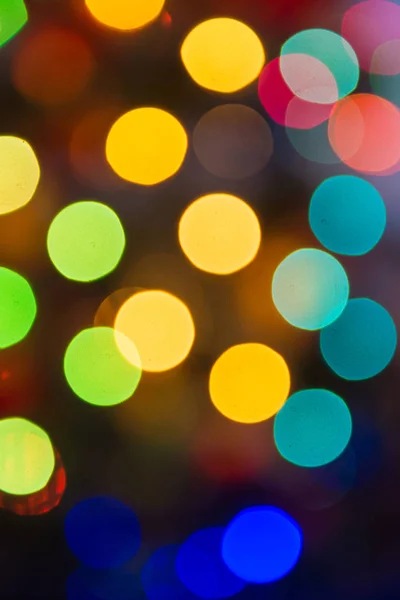Lumières fond bokeh flou de la soirée de Noël pour votre design, vintage ou couleur rétro tonique — Photo