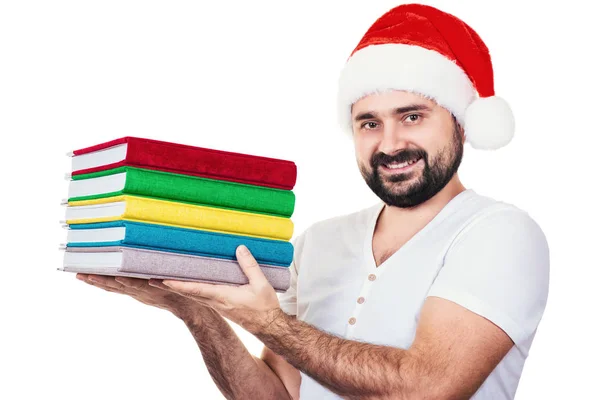 Happy man in Santa hat with a book on the White Background — Stock Photo, Image