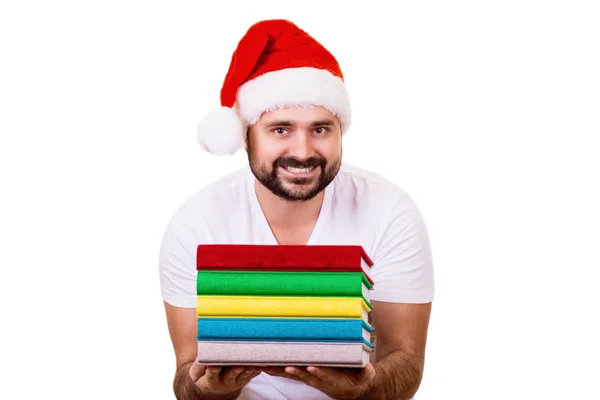 Happy man in Santa hat with a book on the White Background — Stock Photo, Image