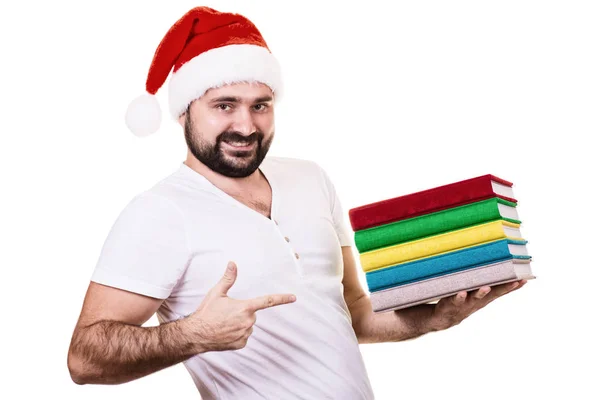Happy man in Santa hat with a book on the White Background — Stock Photo, Image