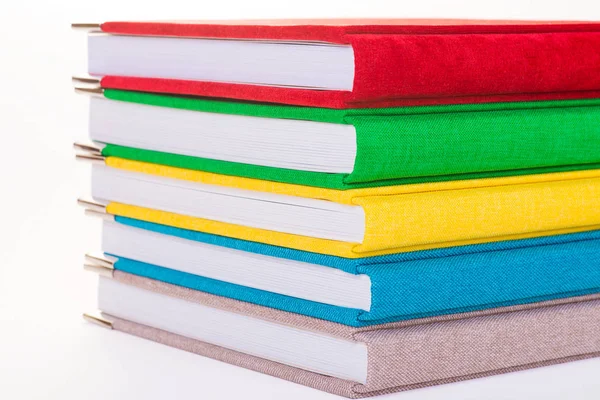 Multicolored book textile cover. Photobooks on a white background. — Stock Photo, Image