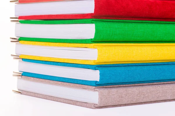 Multicolored book textile cover. Photobooks on a white background. — Stock Photo, Image