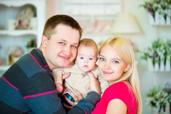 Happy young parents with a small little boy — Stock Photo, Image