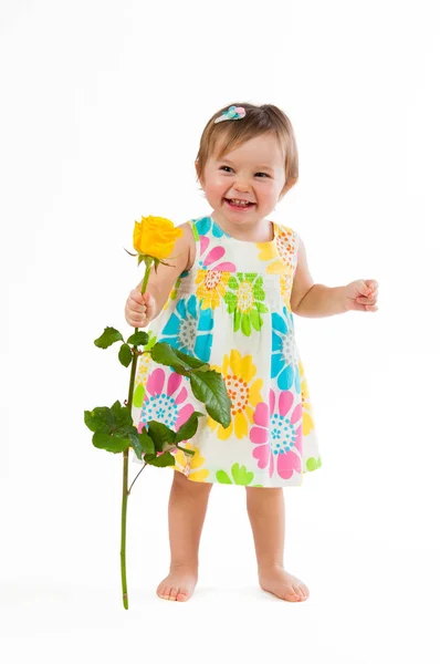 Little cute girl with beautiful yellow rose, romantic gift — Stock Photo, Image