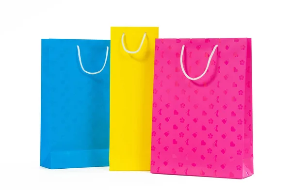 Borsa shopping multicolore in carta isolata su bianco — Foto Stock