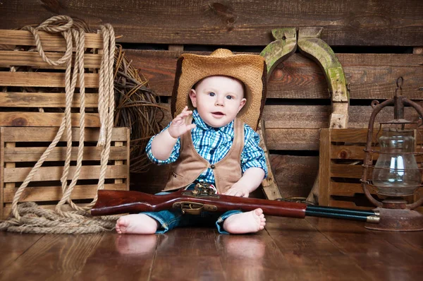 Ritratto di un bambino in stile cowboy — Foto Stock