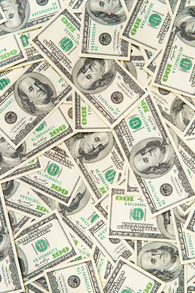 Bakgrund från spridda dollar sedlar som abstrakta sömlösa. — Stockfoto