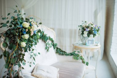 Floristics. Çocuk ayakkabı ve babys cenin ultrason ile güzel bir buket çiçek.