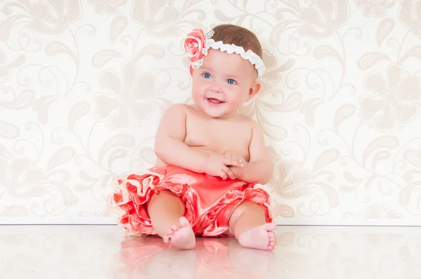 Fashionable smiling baby girl in pink panties — Stock Photo, Image