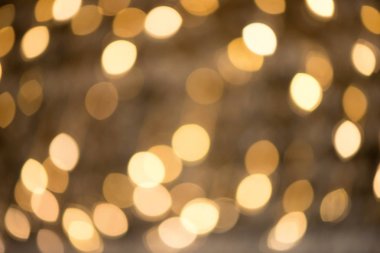 Bokeh altın rengi, parlak ışıkların arka plan. Defocused