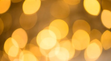 Bokeh altın rengi, parlak ışıkların arka plan. Defocused