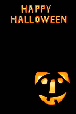 Mutlu Cadılar Bayramı Balkabağı siyah artalan üzerinde korkunç yüzü