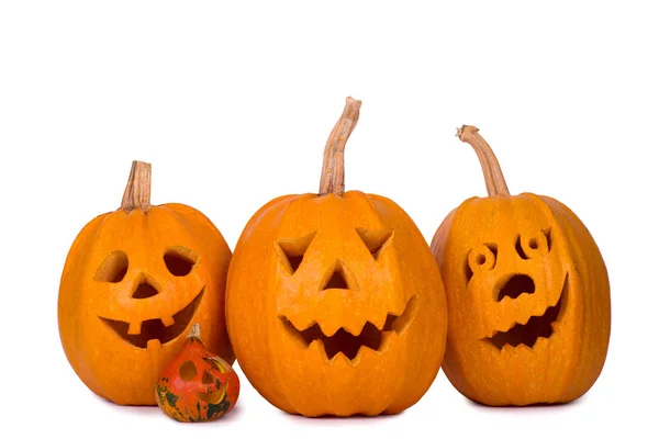 Halloween dýně, tři legrační obličej izolovaných na bílém pozadí — Stock fotografie