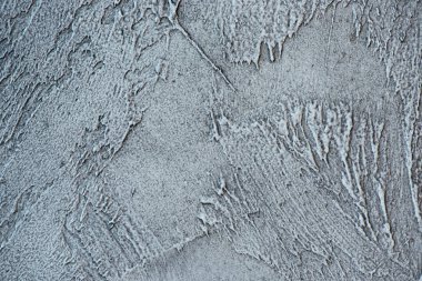 Yapılandırılmış gri macun. Venedik sıva dokusunun eski veya pis arkaplanı kalıp duvar olarak.