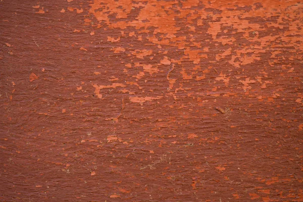 Brun vägg konsistens för bakgrunden. Gammal peeling färg — Stockfoto