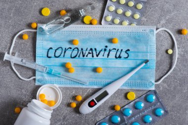 Covid-19 Coronavirus ve grip salgını. Spekülasyon, aşı işi ve haplar. Para ve sağlık, dünya çapında salgın.
