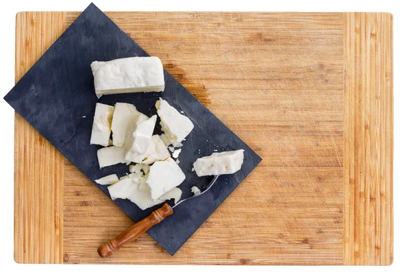 Corte pedaços de queijo feta e garfo — Fotografia de Stock