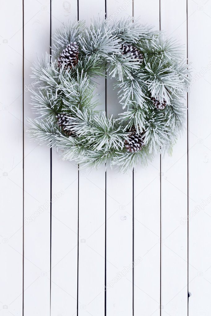 Decorative white stained green Christmas wreath