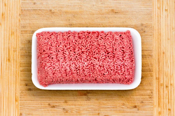 Close up on a container of fresh ground beef — Stock Photo, Image