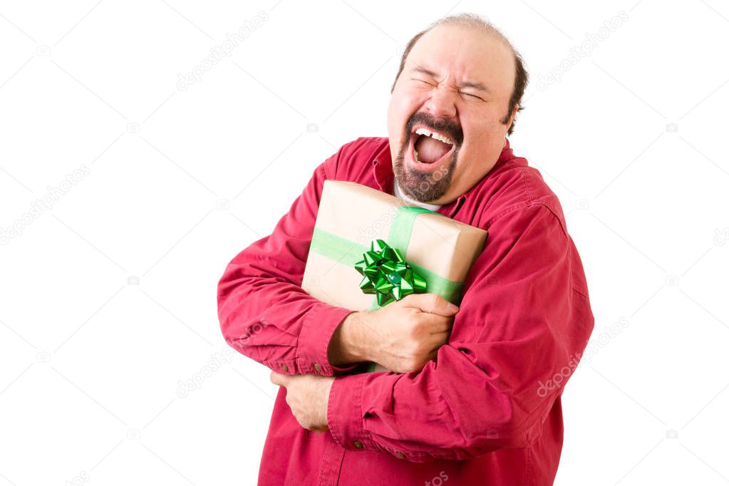 Happy screaming man in red holding gift