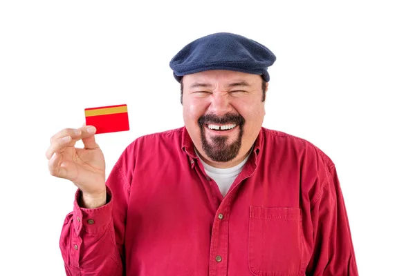 Neşeli adam bir banka kartı tutan — Stok fotoğraf