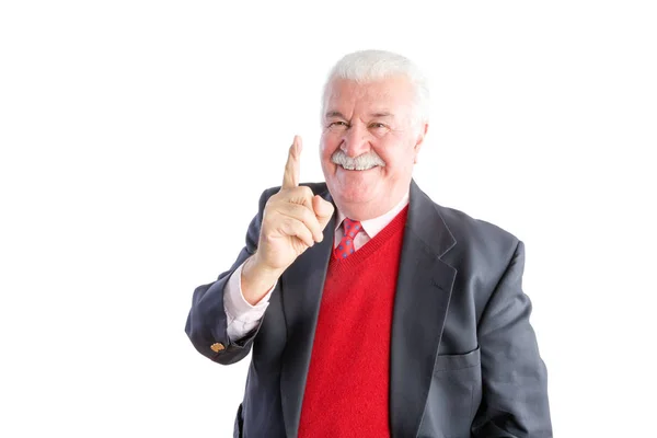 Cheeky senior wearing a business suit smiles — Stock Photo, Image