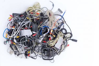 Jumbled pile of electrical cords and connectors clipart