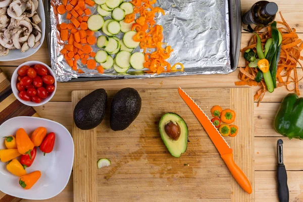 Preparing assorted fresh vegetables for cooking — Stock Photo, Image