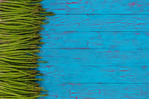Side border of fresh green asparagus spears — Stock Photo, Image