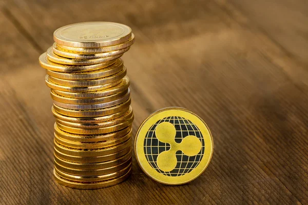 A single gold Ripplecoin digital coin — Stock Photo, Image