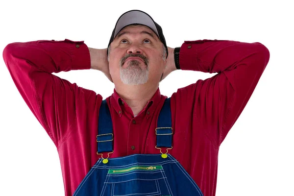 Curious farmer looking up observing something — Stock Photo, Image