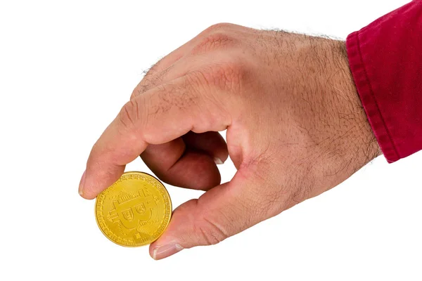 Hand holding golden cryptocurrency coin — Stock Photo, Image