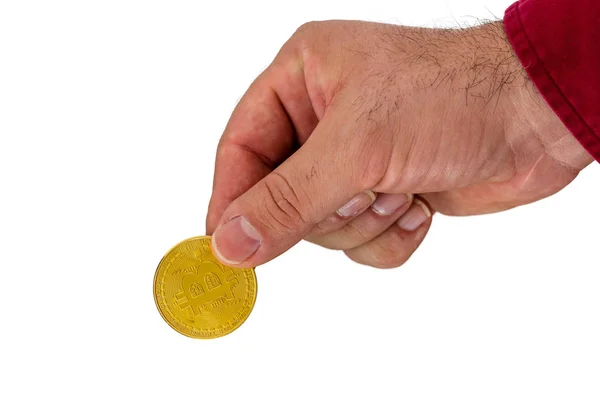 Рука с криптовалютой золотой монетой — стоковое фото
