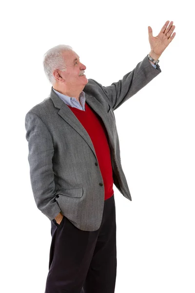 Homem de cabelos grisalhos sênior levantando o braço esquerdo — Fotografia de Stock