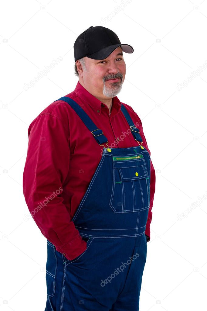 Sceptical man on overalls with a dubious look