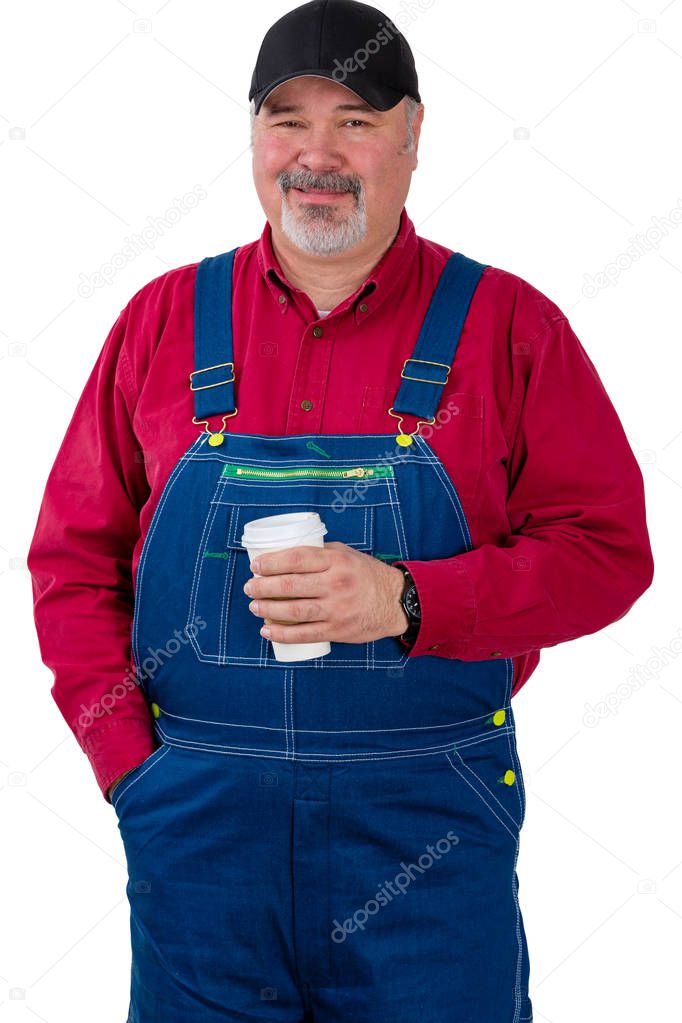 Friendly smiling farm worker holding coffee