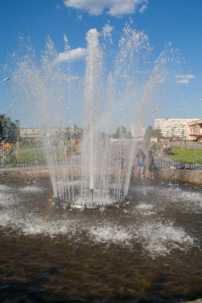 Rainbow in fountain splashes — Stock Photo, Image